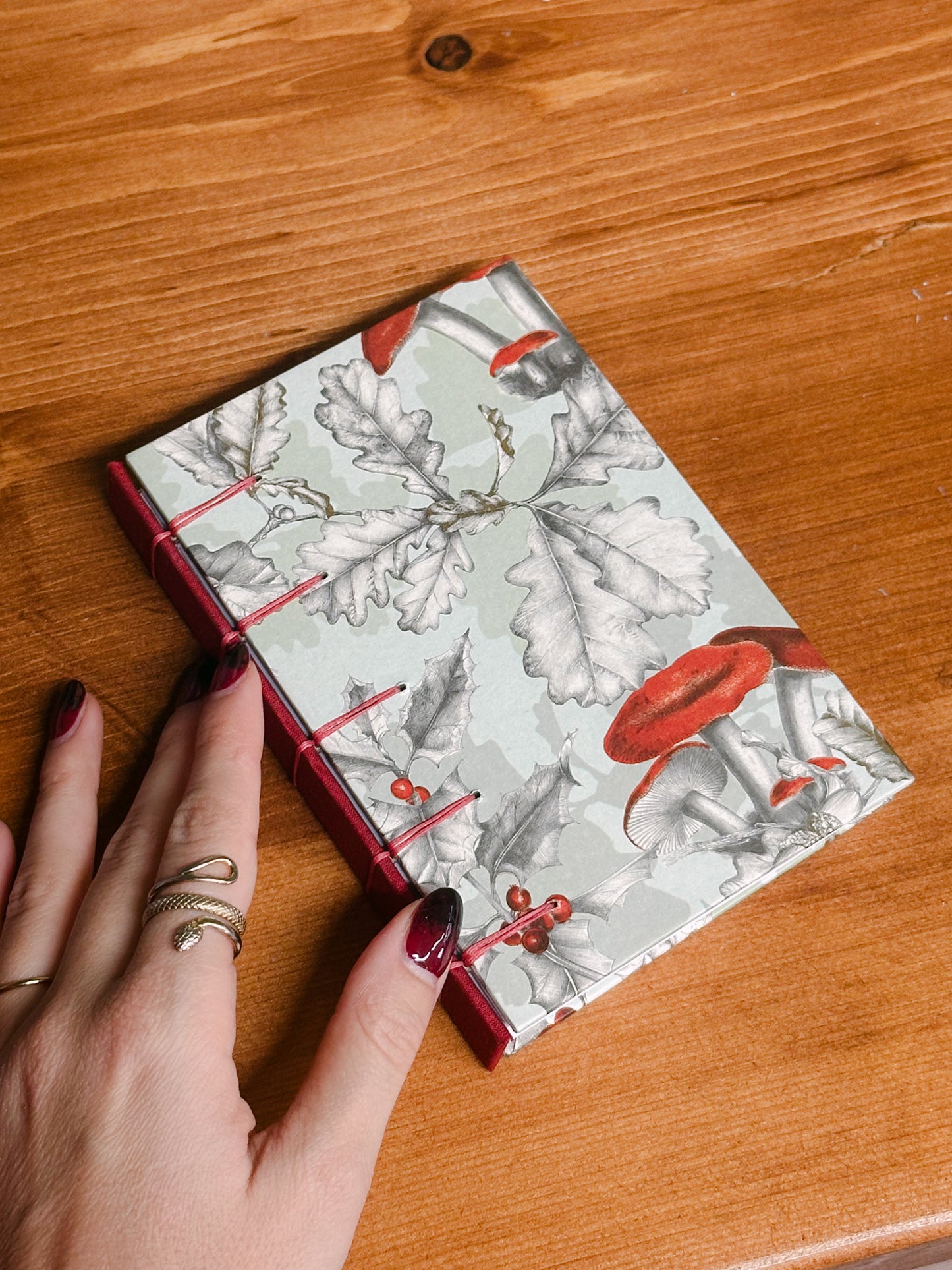 Quadernino legatura belga, copertina in carta decorata funghi